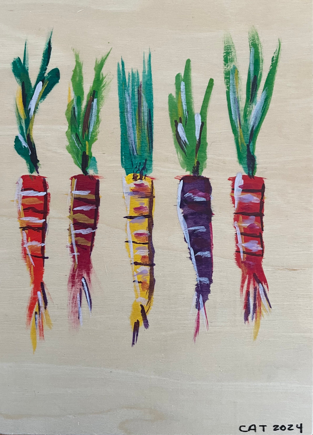 Colorful carrots on wood (v)