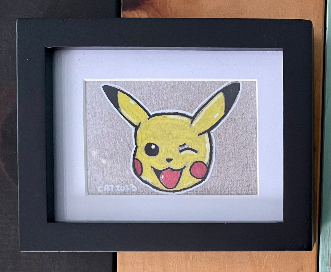 Mini Pikachu framed prints